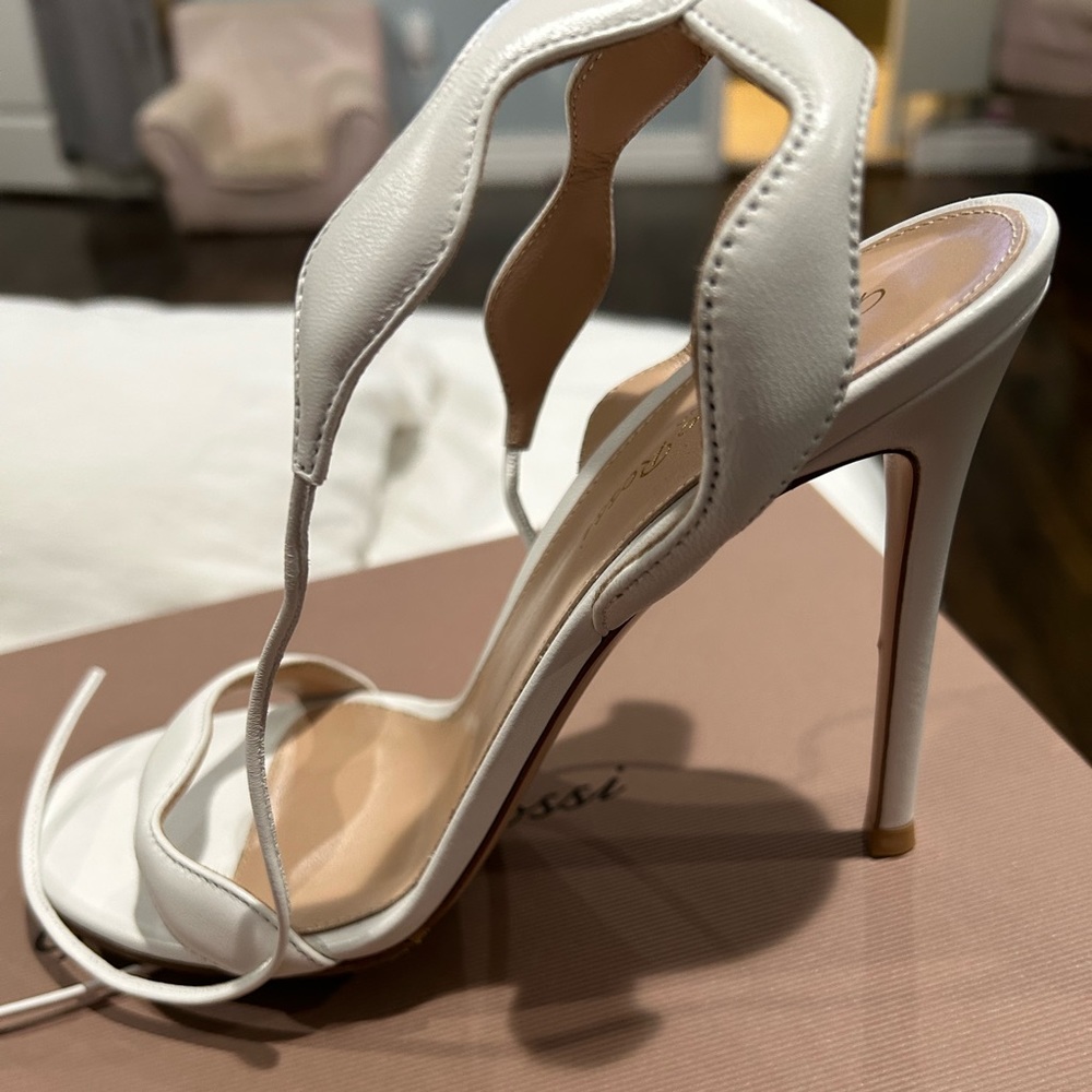 Brand new Gianvito Rossi heels. Never worn. Rubber sole added for comfort.